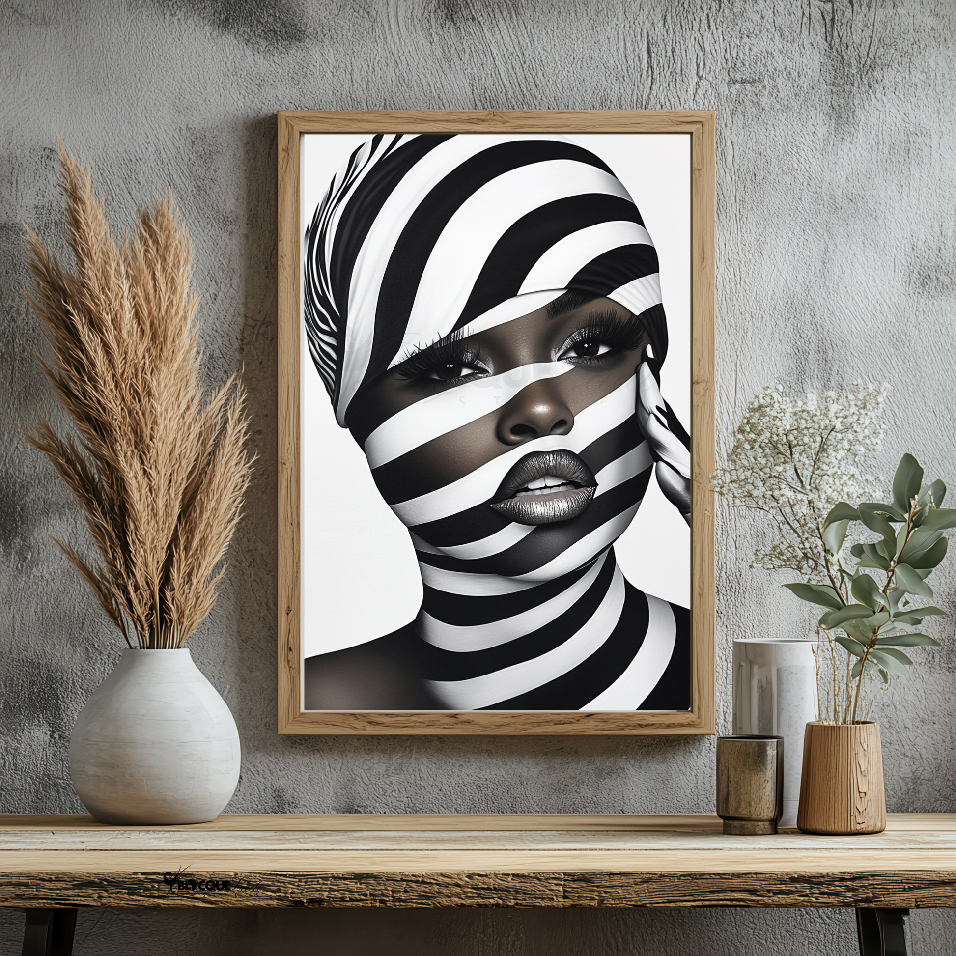 This digital artwork, titled Strength in Black & White Stripe, features a bold and abstract portrait of an African American woman. Her face is elegantly defined by high-contrast black and white tones, with striking gold accents adding depth and sophistication. The artwork is a fusion of modern and Afrocentric styles, using expressive lines and abstract patterns to symbolize strength, resilience, and cultural pride. The composition is powerful, making a statement about beauty, identity, and encouragement.
