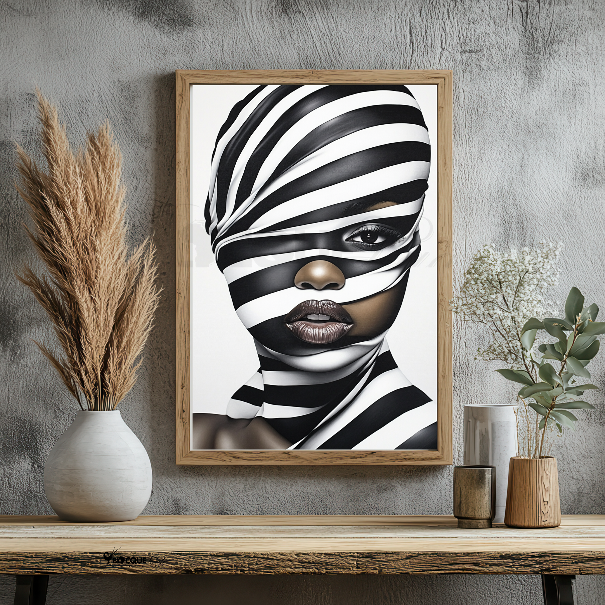 This digital artwork, titled Strength in Black & White Stripe, features a bold and abstract portrait of an African American woman. Her face is elegantly defined by high-contrast black and white tones, with striking gold accents adding depth and sophistication. The artwork is a fusion of modern and Afrocentric styles, using expressive lines and abstract patterns to symbolize strength, resilience, and cultural pride. The composition is powerful, making a statement about beauty, identity, and encouragement.