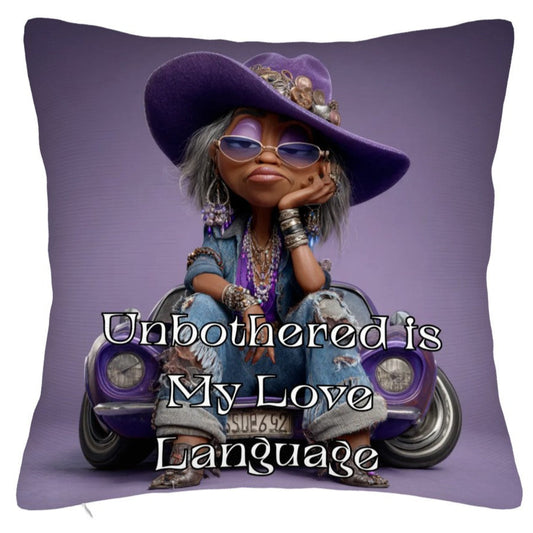 Pillow with a cartoon character wearing sunglasses and a purple hat, sitting on a motorcycle, with text 'Unbothered is My Love Language' on a purple background.